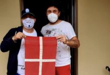 Il Vessillo di San Giorgio (che vinse la Peste) a Carlo Olmo, uomo-simbolo contro il Covid